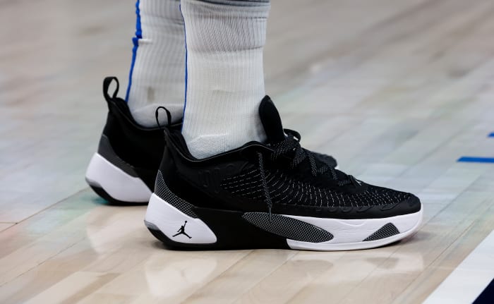 View of black and white Jordan Luka shoes.